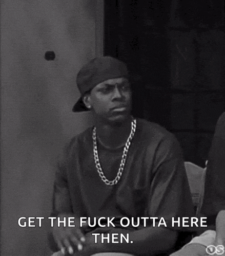 a black and white photo of a man wearing a hat and a chain saying get the fuck outta here then .