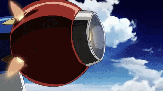 a close up of a red object in the sky