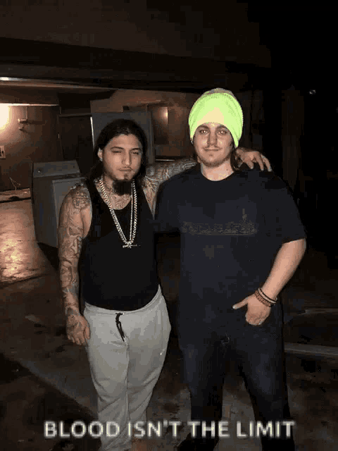 two men standing next to each other with the caption blood is n't the limit on the bottom