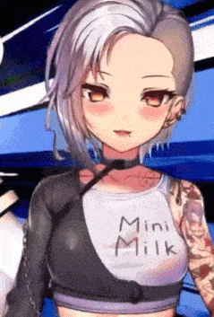 a girl with a tattoo on her arm is wearing a shirt that says mini milk .