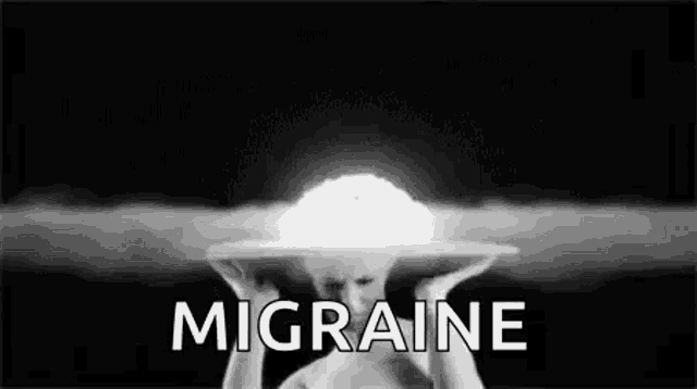 a black and white photo of a person with a nuclear explosion in the background and the words `` migraine '' .