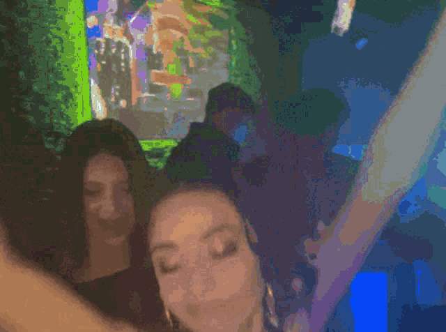 a blurry picture of a woman being held by a man
