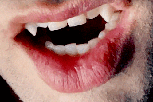 Vampire Bite GIF - Vampire Bite Lip Bite GIFs