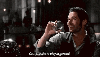 a man with a beard is drinking a glass of whiskey and saying `` oh , i just like to play in general ''