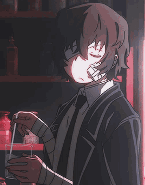 a man with a bandage on his face is holding a glass