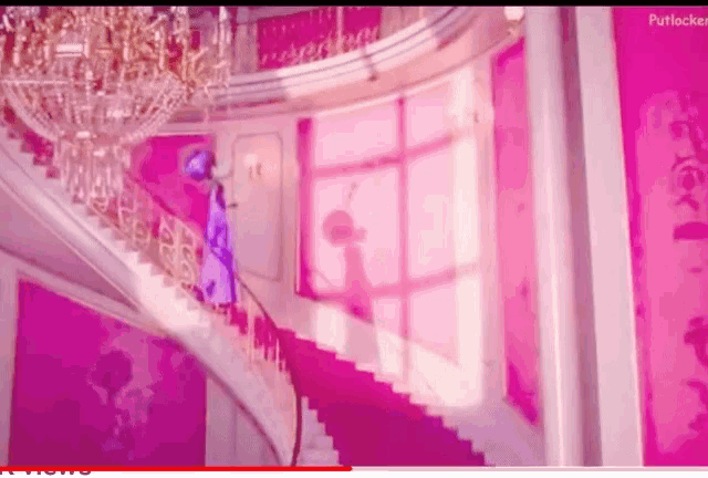 a staircase in a pink room with the word putlocker on the bottom right