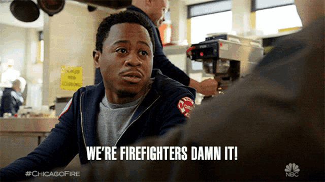 a man says we 're firefighters damn it in front of a coffee machine