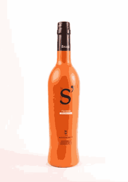 a bottle of scotch sits on a table