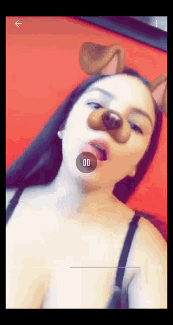 a woman wearing a dog face mask with the number 00 in the circle