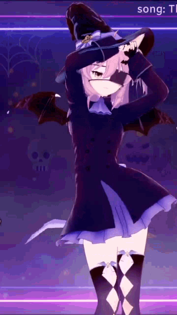 a girl in a witch costume is dancing with a bat