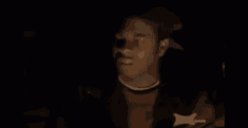 a man wearing a hat and a sweater with a nick.com logo