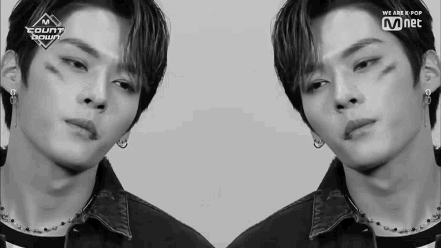 a black and white photo of a young man with the words we are k pop on the bottom