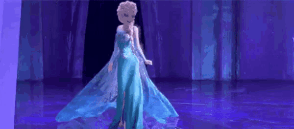 elsa from frozen is dancing on a stage .
