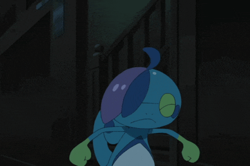 a blue lizard with a surprised look on its face