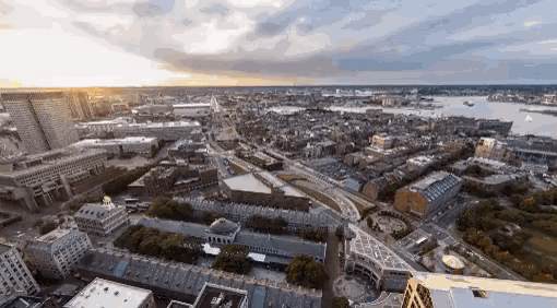 an aerial view of a city with lots of buildings