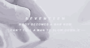 a close up of a person 's finger with the words seventeen written on it .