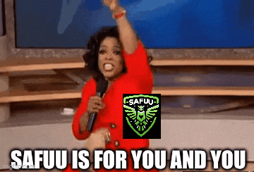oprah winfrey holds a microphone in front of a screen that says safuu is for you and you