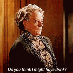 an elderly woman is asking if she might have drink