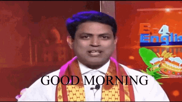 a man says good morning in front of a screen that says e4 english