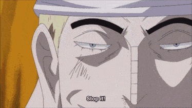 a close up of a man 's face with the words stop it