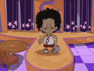 a cartoon character is standing on a stage holding a stick