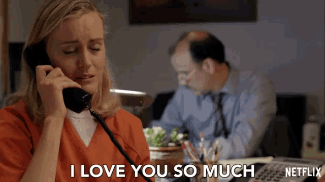 a woman talking on a phone with the words " i love you so much "