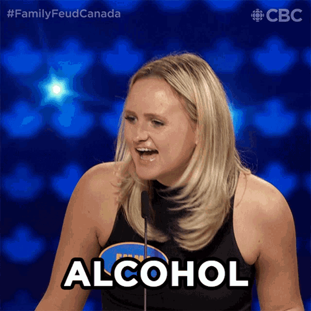 a woman in a black tank top says alcohol