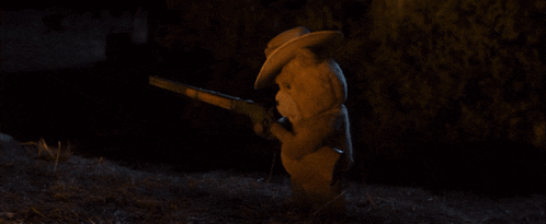 a person is holding a torch in the dark