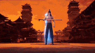 a man without a shirt is holding a sword in front of a castle