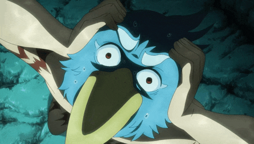 a blue bird with a yellow beak is being held by two hands