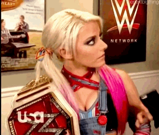 a woman is holding a wrestling championship belt that says usa on it