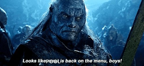 a man with long hair and a sword says " looks likepool is back on the menu boys "