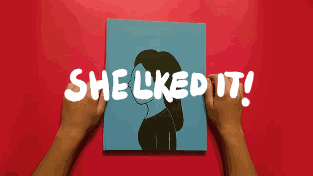 a person is holding a blue book that says she liked it