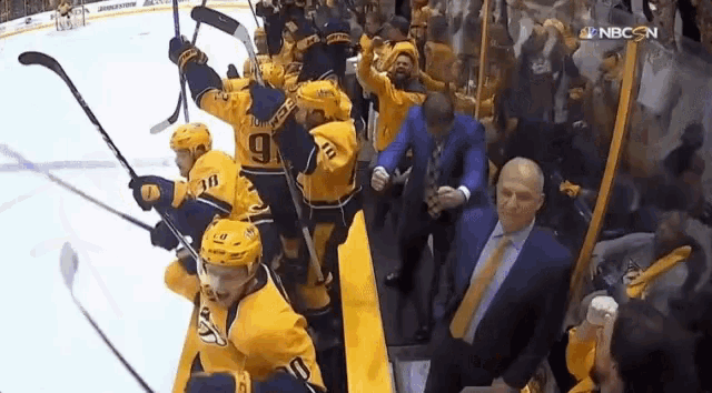 a hockey game is being broadcast on nbc on the screen