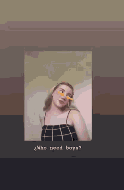 a woman wearing sunglasses and a plaid top is asking who need boys