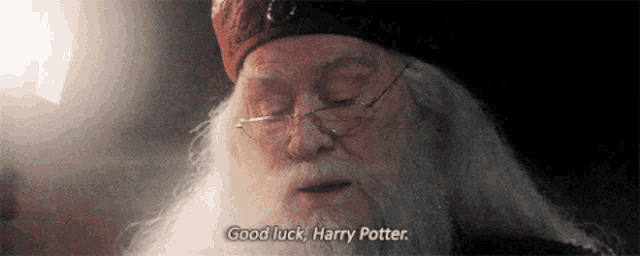 an old man with a beard and glasses is saying good luck harry potter