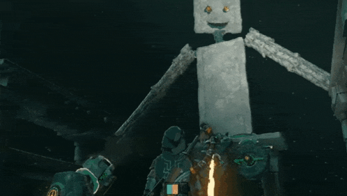 a man is standing next to a giant robot with a fire coming out of his mouth .