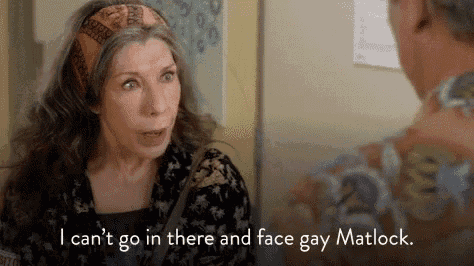 a woman is talking to a man in a room and says `` i can 't go in there and face gay matlock. ''