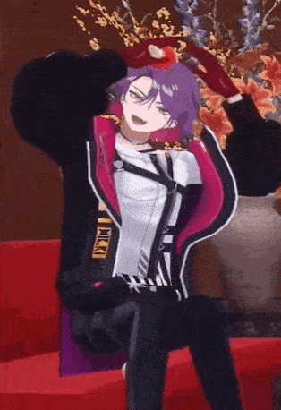 a girl with purple hair is sitting on a red couch holding a slice of apple .