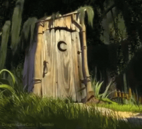 a wooden outhouse with a letter c on it