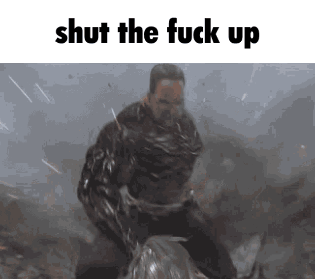 a picture of a man with the words shut the fuck up