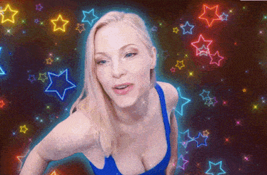 a woman in a blue tank top with neon stars around her