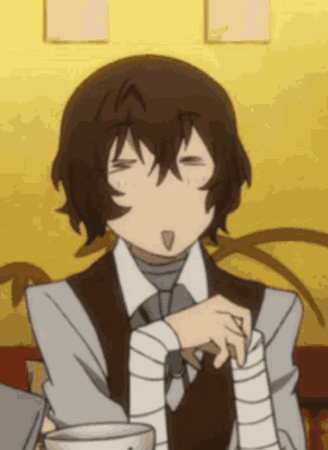 a man in a suit and tie is making a funny face while holding a cup of coffee