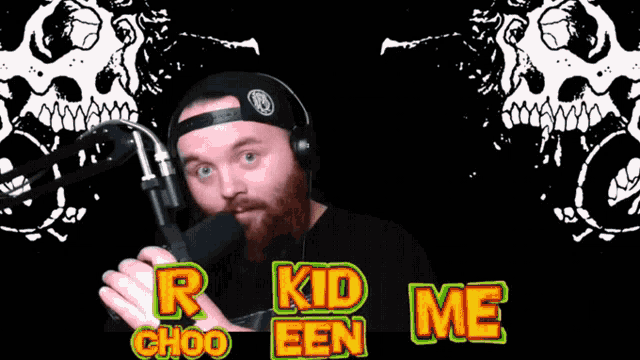 a man wearing headphones holds a microphone in front of two skulls and the words " r kid een choo "