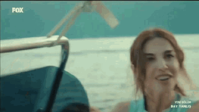 a woman on a boat with fox written on the screen