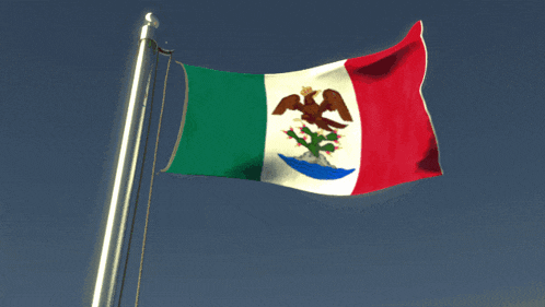 a mexican flag with an eagle on it is flying in the wind