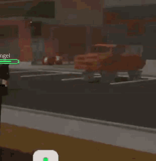 a red truck is parked in a parking lot in a video game with a person standing next to it .