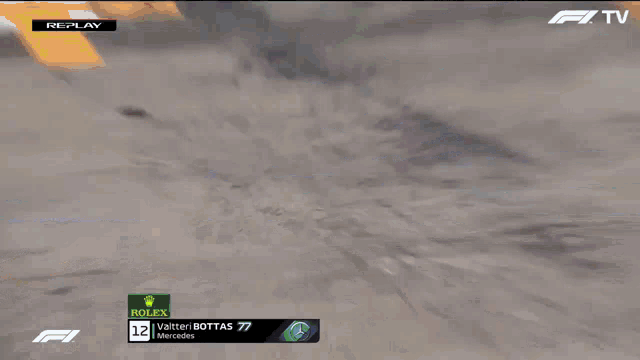 a replay of a race with walter bottas in the number 77 position