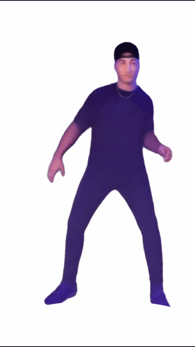 a man in a black shirt and purple pants dancing