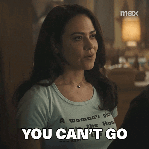 a woman wearing a t-shirt that says " a woman 's place " says you can 't go